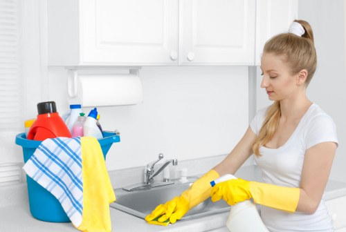 Professional upholstery cleaning equipment used on a couch